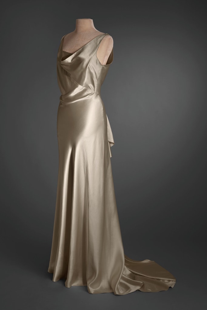 Post didn't care about labels and removed the tag from this cream silk crêpe and cream organza evening dress, circa 1933.