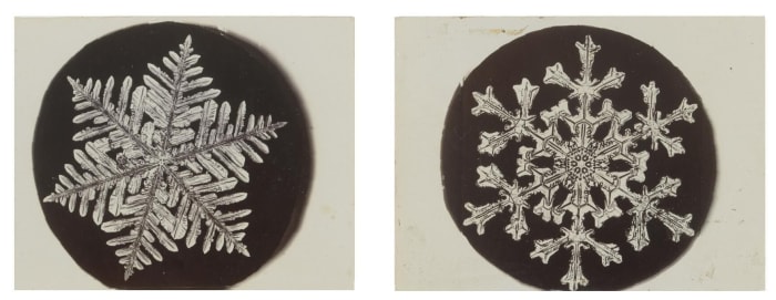 Two of a group of 40 photomicrographs of Bentley’s snowflakes, circa 1885-1923, that sold at Sotheby’s for $32,200.