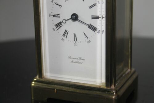 A Brass Framed Carriage Clock Timepiece By Bornand Freres Montbeliard