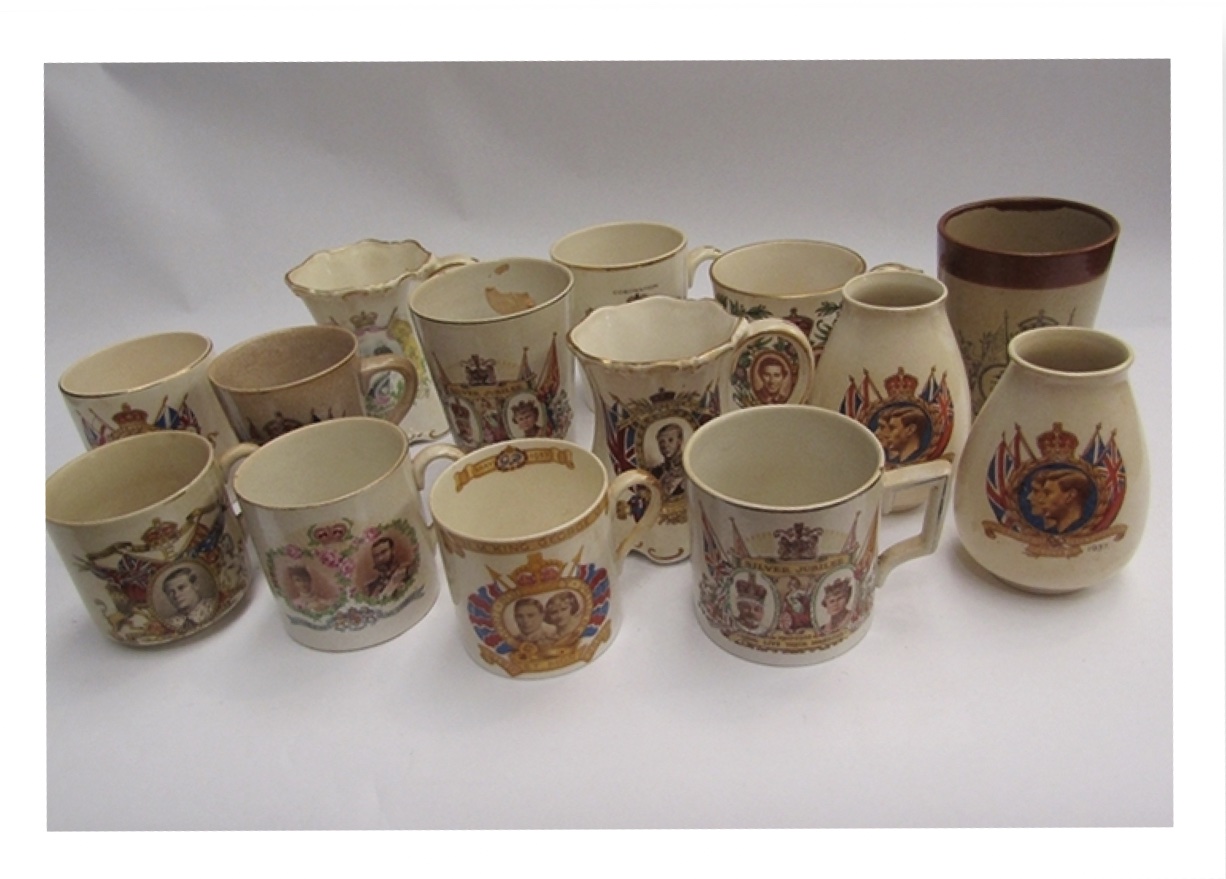 A collection of royal commemorative mugs