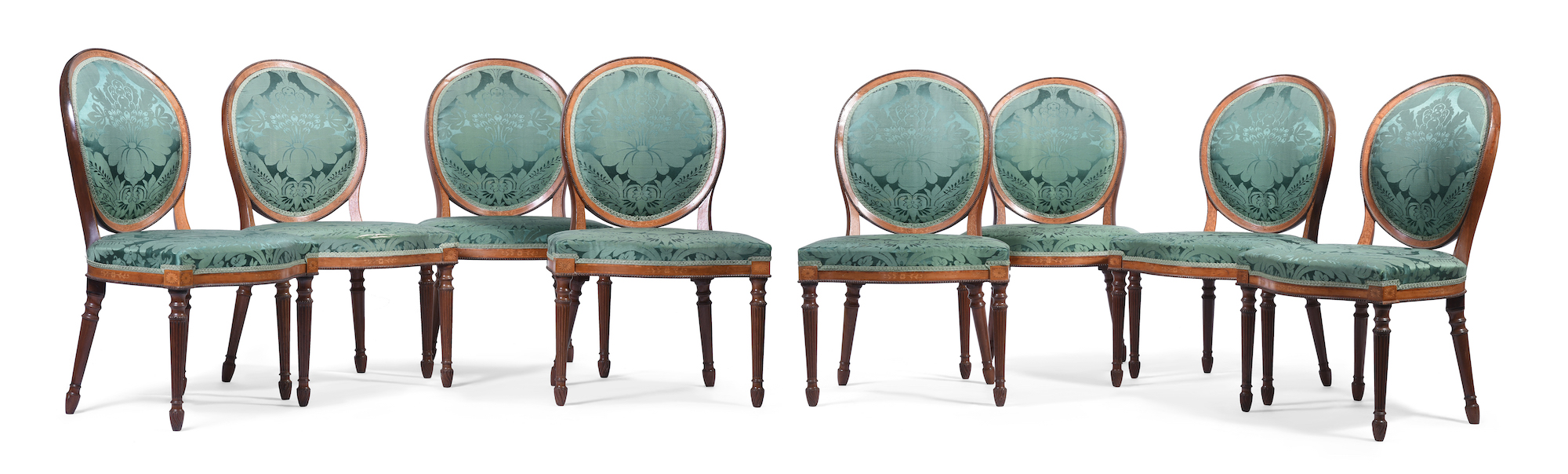 A set of eight George III chairs in the manner of John Linnell