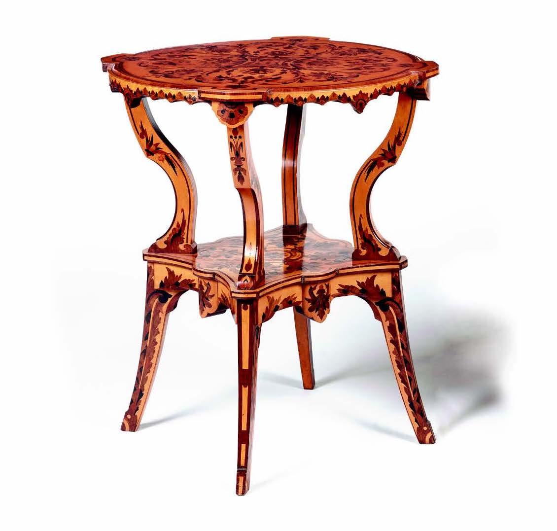 An antique marquetry table made by Jackson & Graham