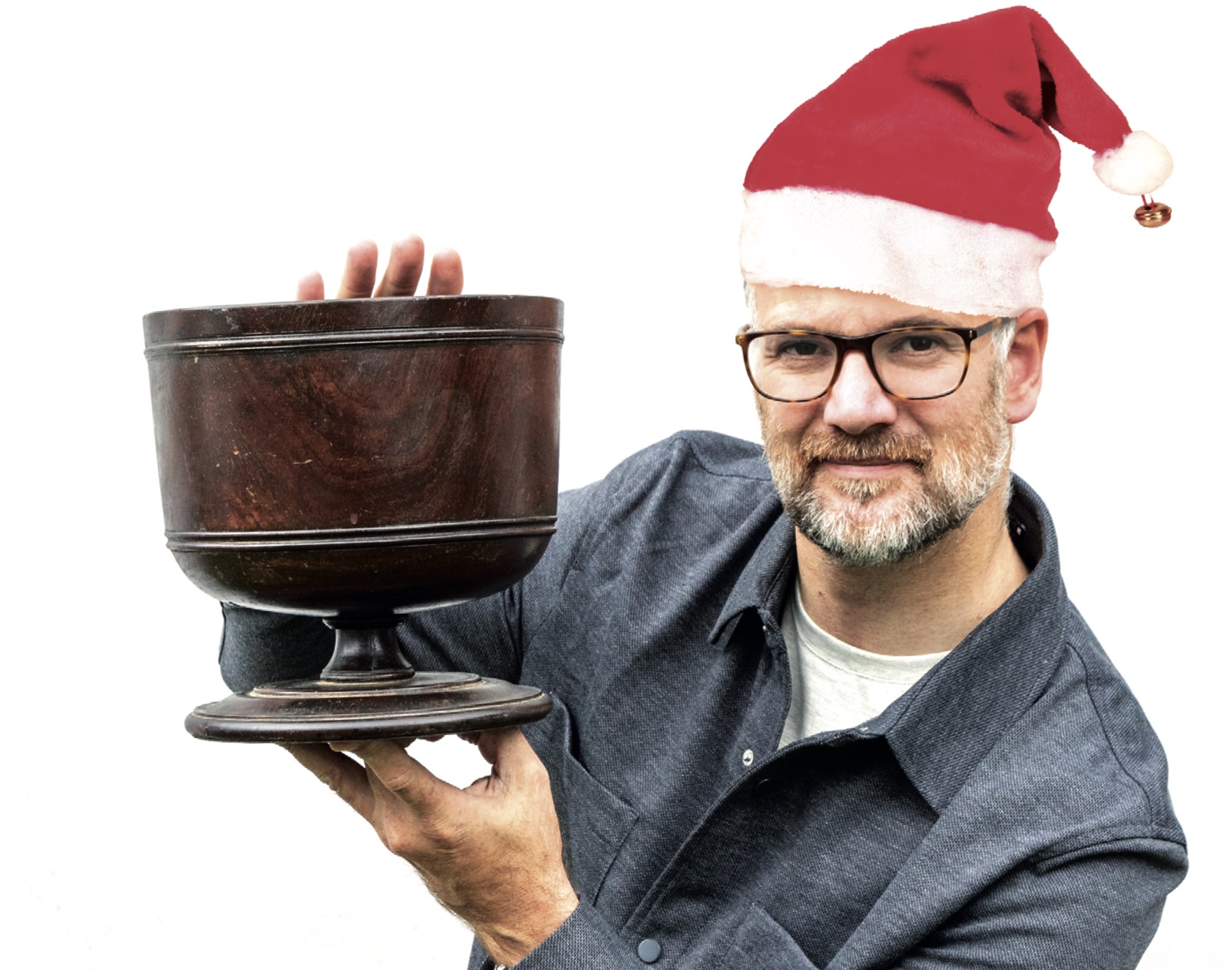Auctioneer Charles Hanson with an antique wassail cup