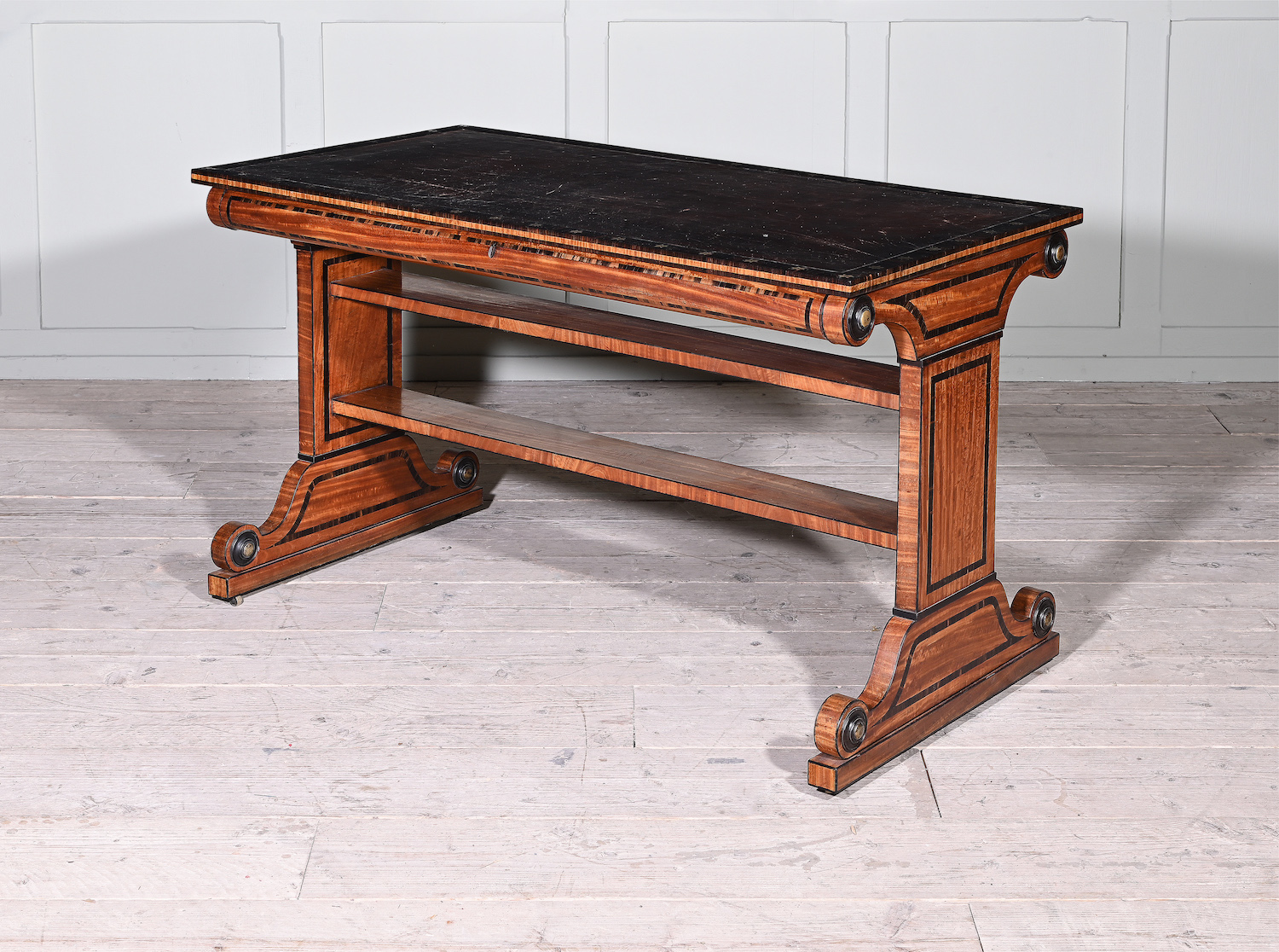 A fine regency satinwood, Macassar and ebony library table by George Oakley (1773-1840)