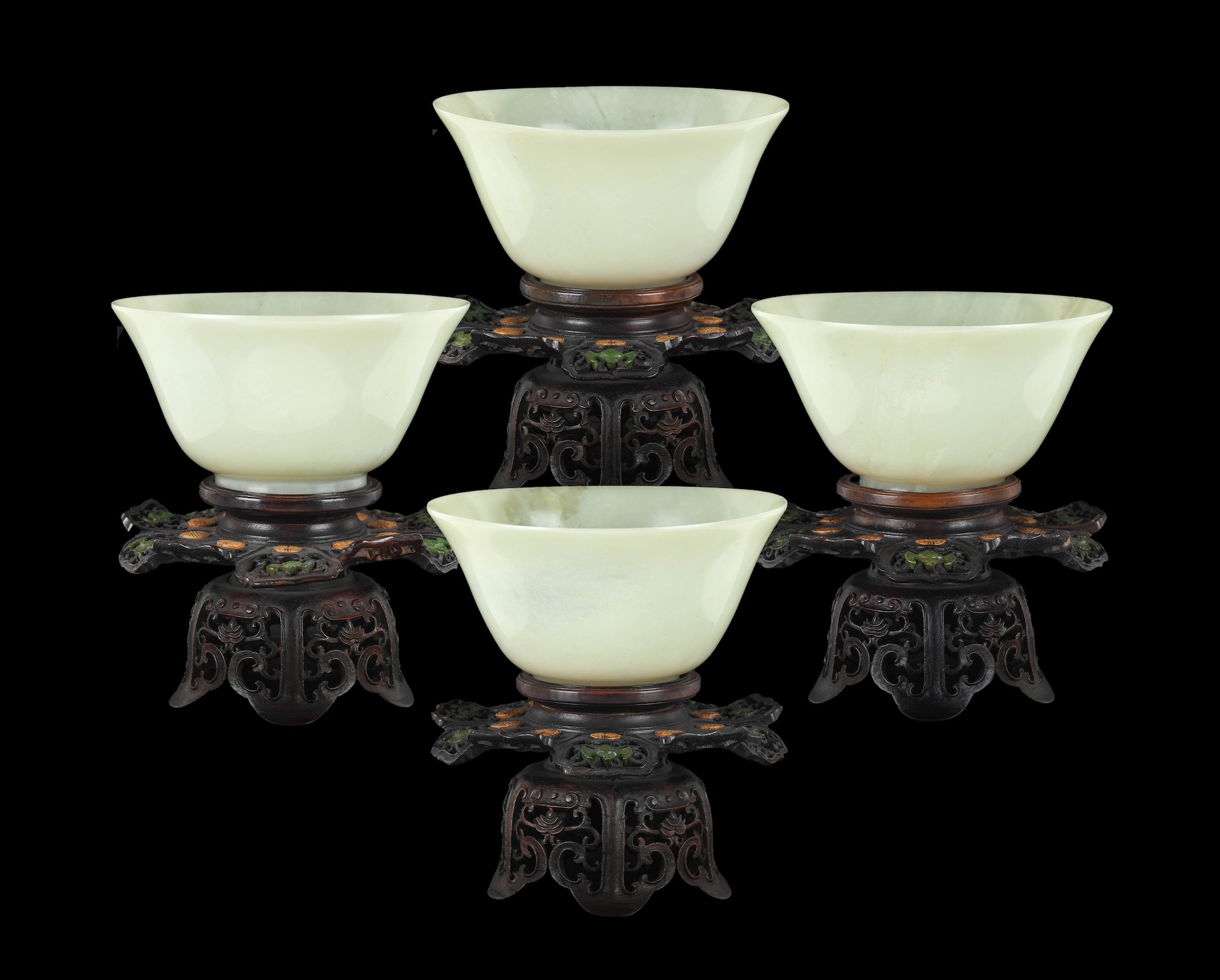 A set of four Chinese pale celadon jade bowls, Qing Dynasty, probably Qianlong