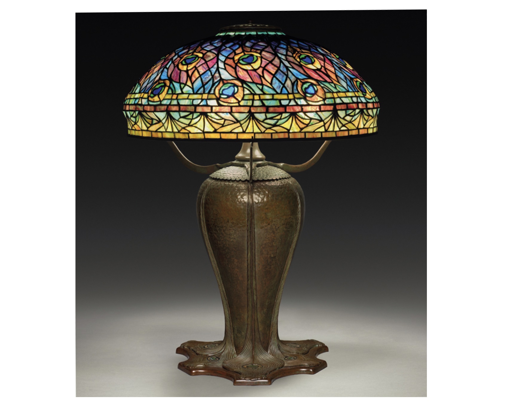 Peacock table lamp, c. 1902, designed by Clara Driscoll (1861–1944), maker Tiffany Studios