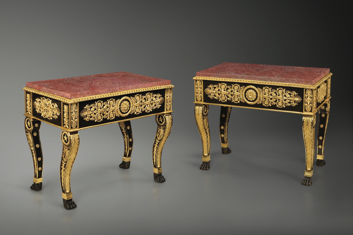 An important pair of Restauration gilt and patinated bronze centre tables