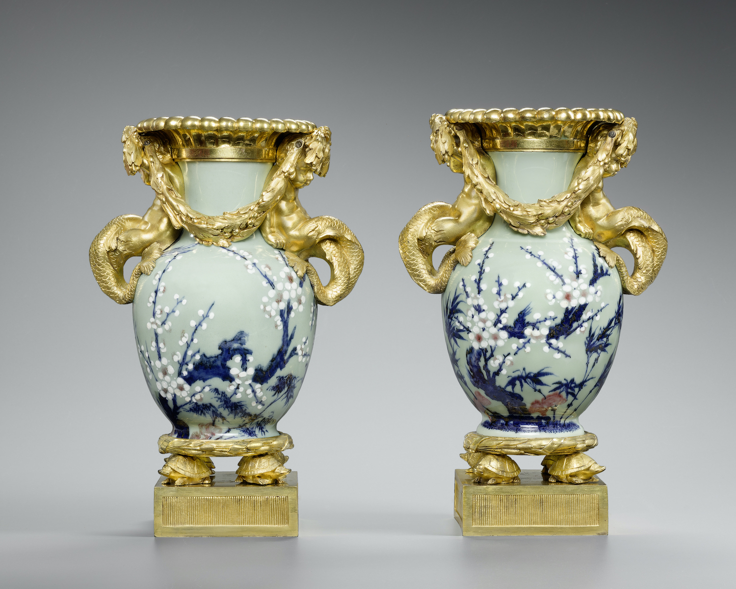 A very rare pair of late Louis XV celadon fleuri porcelain vases aux enfants tritons from the collection of the Duc de Chaulnes