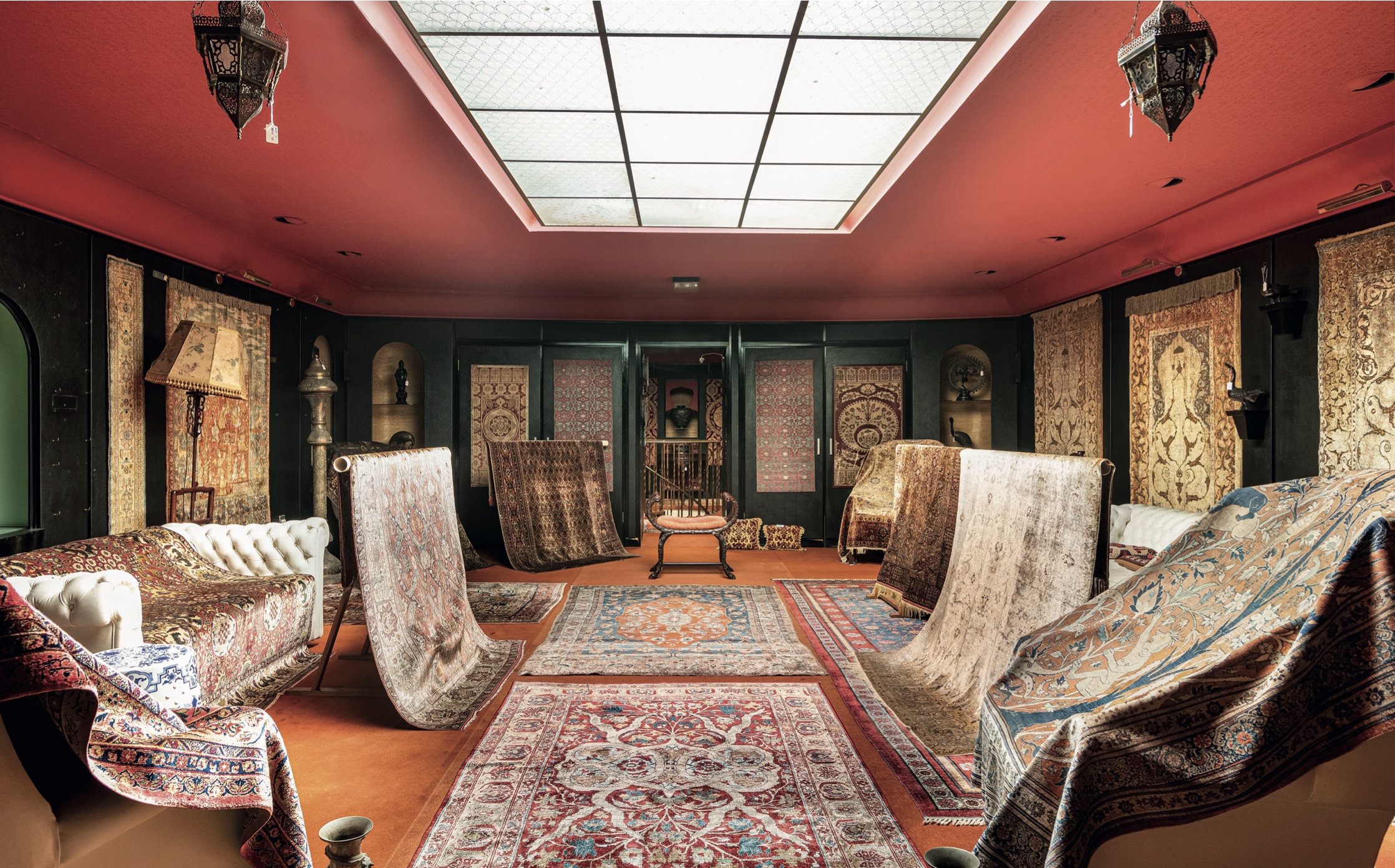 A collection of antique rugs and carpets