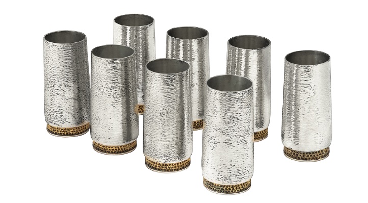 A collection of cups by the silversmith Stuart Devlin