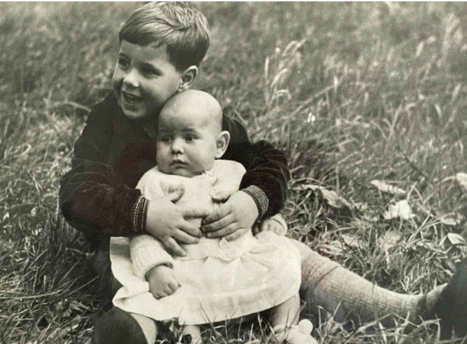 A baby Charlie Ross, held by big brother Stewart, in 1951