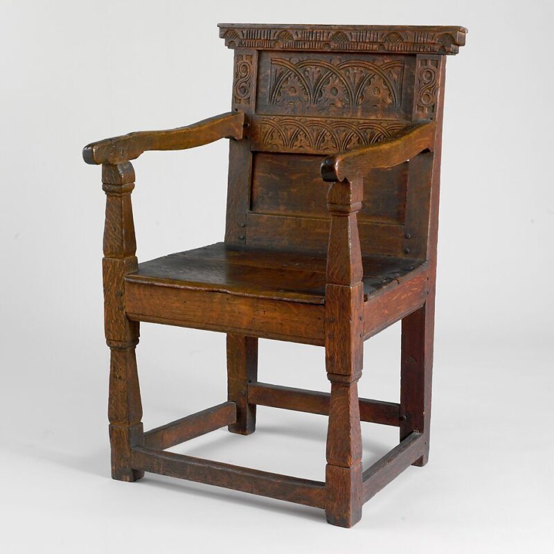 Based on English Renaissance and Mannerist designs, this example, with its solid, vigorous form enlivened by carving, has a commanding presence.