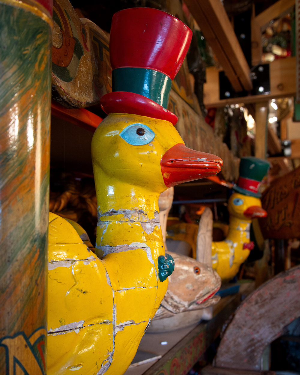 A carved wooden duck from an old fairground