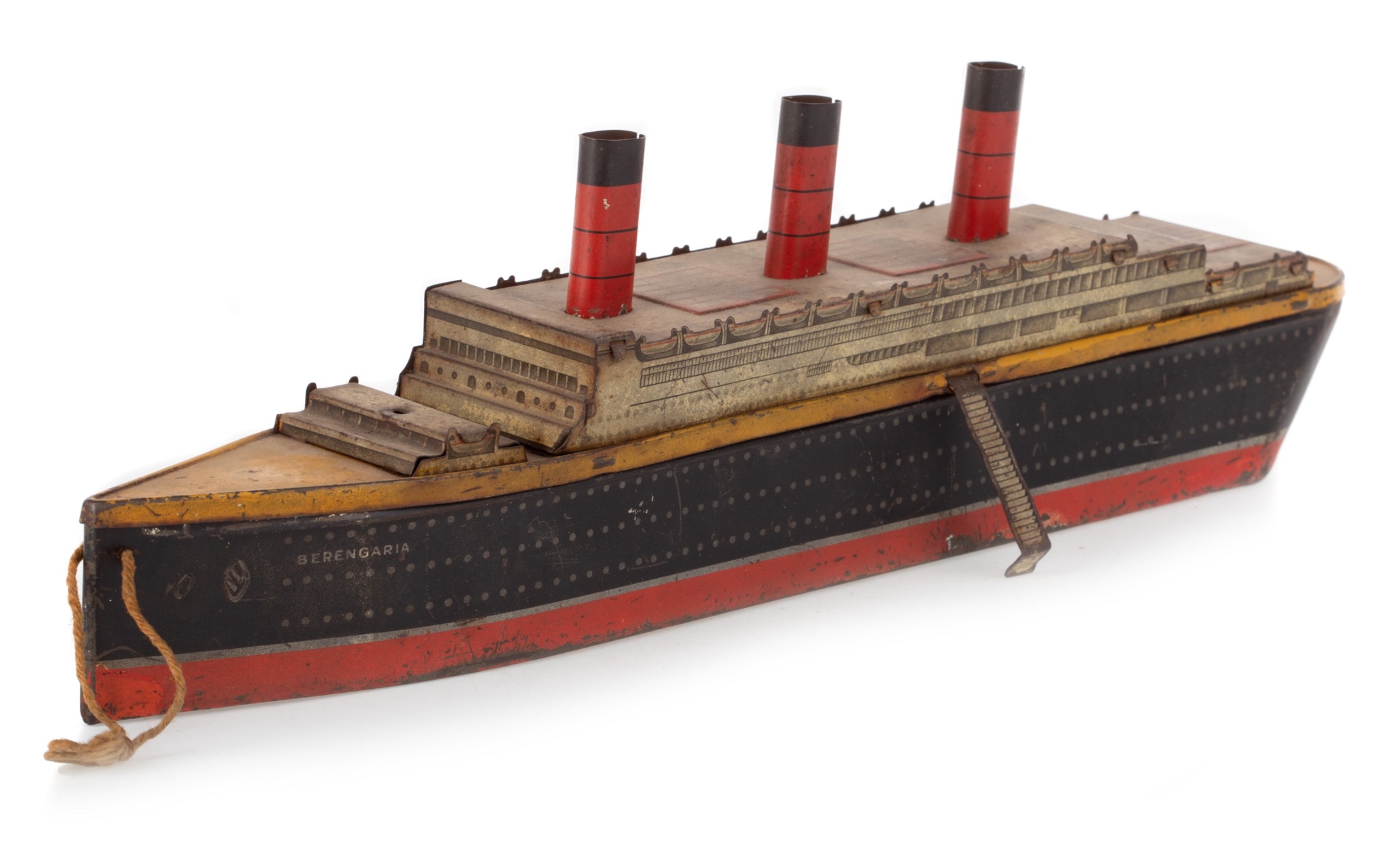 An antique biscuit tin in the shape of a liner ship