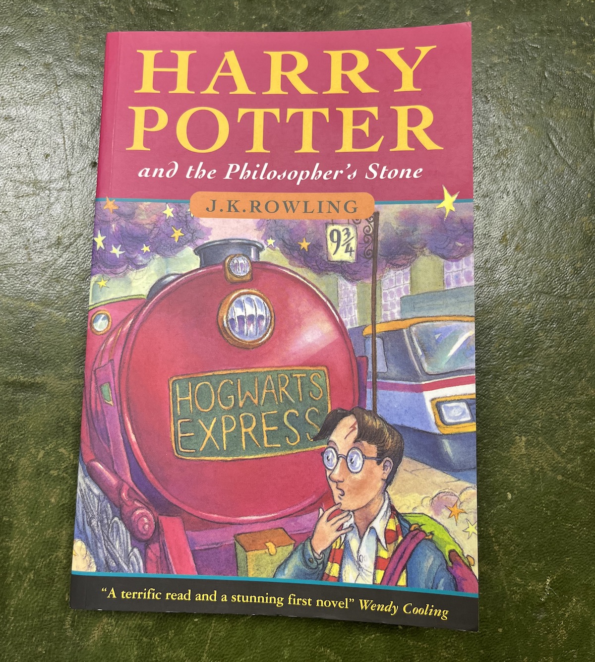 A first edition paperback of 'Harry Potter and the Philosopher's Stone'