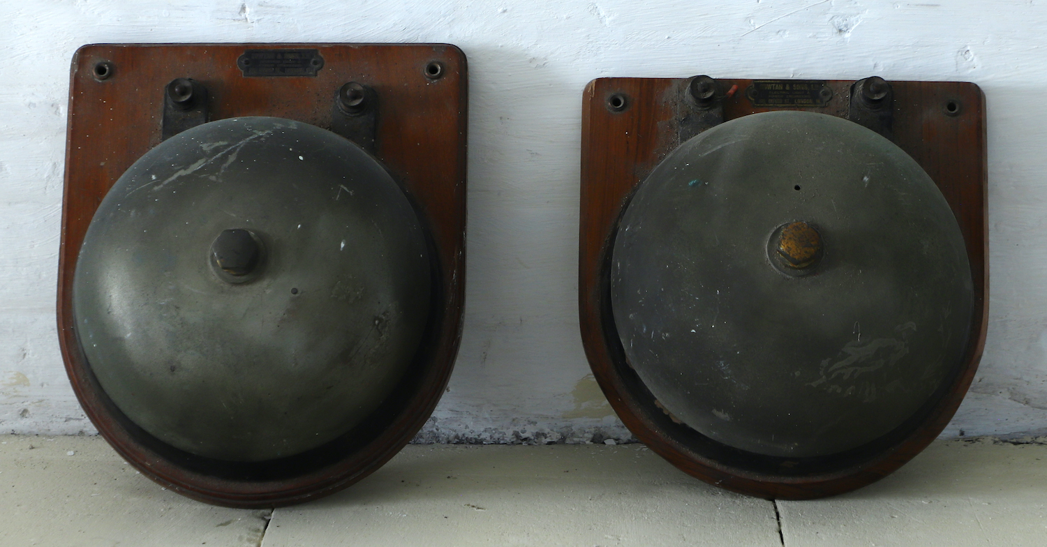 A pair of antique electric-powered servants bells by Cowton & Sons of Oxford Street 