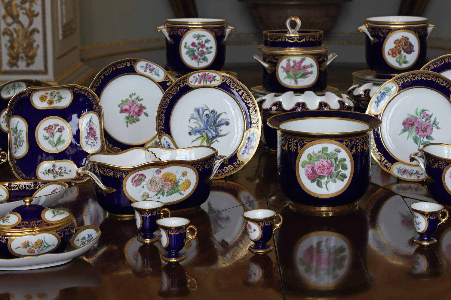 An antique Sèvres 'beau bleu' ground dessert service from the Holkham Hall Attic Sale