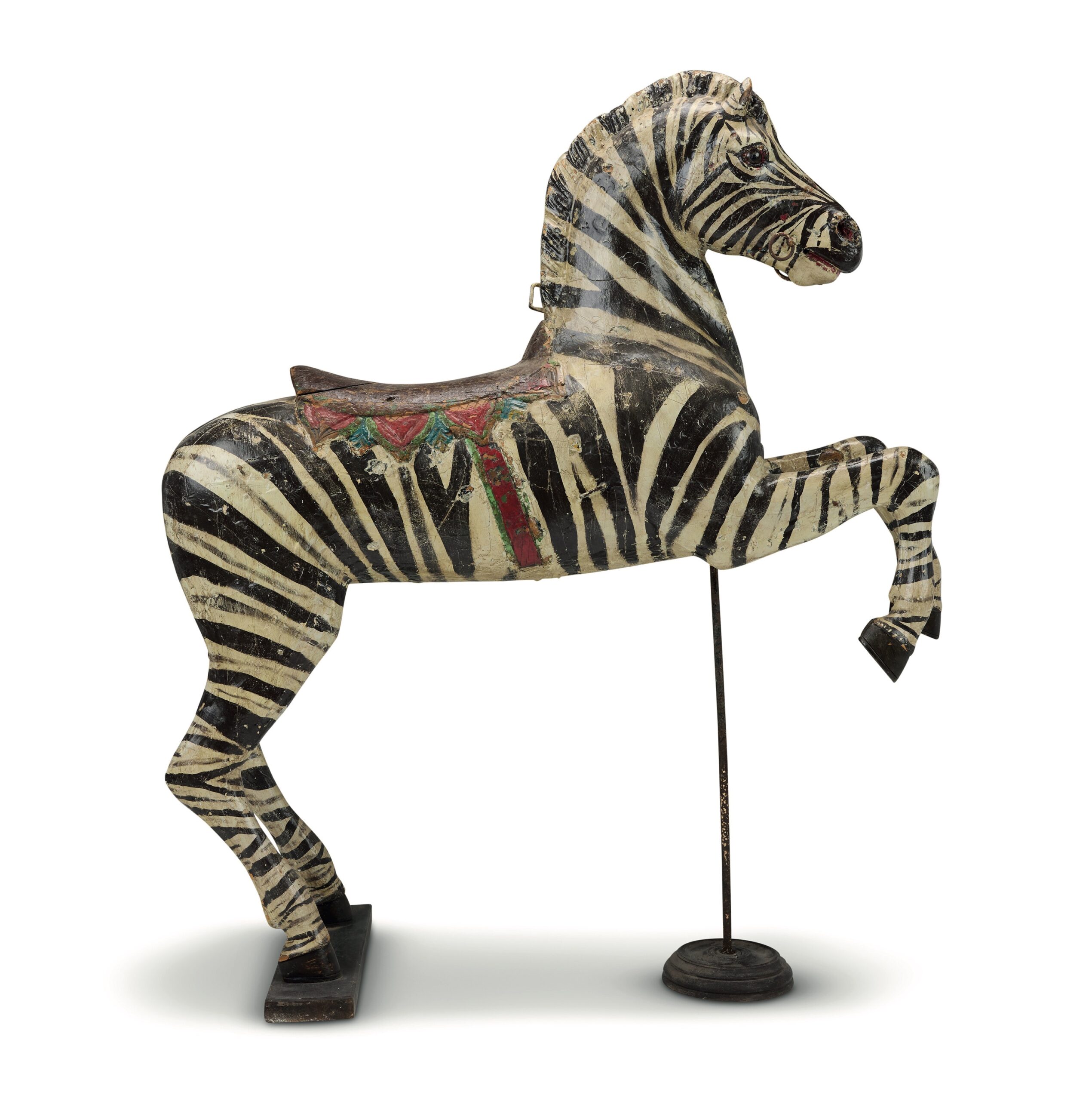 A German carved and painted platform ride figure of a zebra made by Friedrich Heyn, c.1900