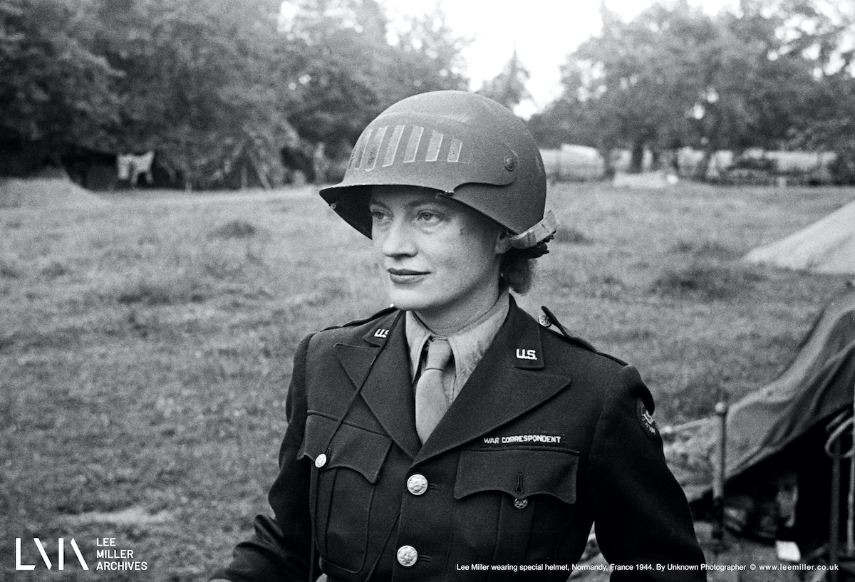 Photographer and war correspondent Lee Miller wearing special helmet, Normandy, France, 1944